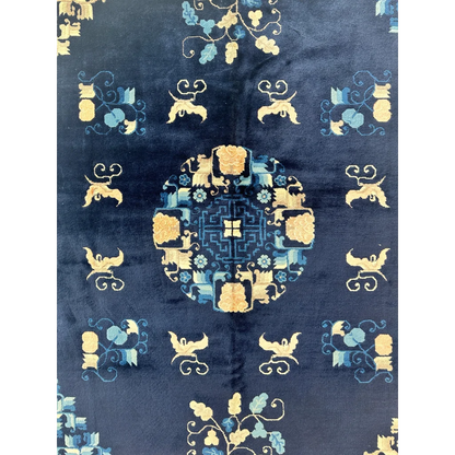 Stunning antique Chinese Peking rug in deep navy blue with gold medallion