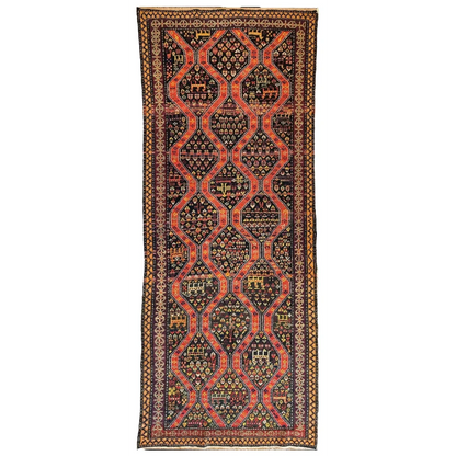 Antique 1910s Caucasian Kazak rug, full view, bold geometric patterns in reds and oranges