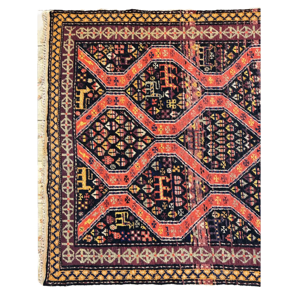 1910s Kazak rug from the Caucasus, bold geometric and floral patterns in red black and orange