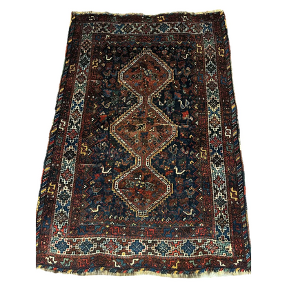 Antique 1920s Persian Khamseh tribal rug with dark brown and blue geometric patterns