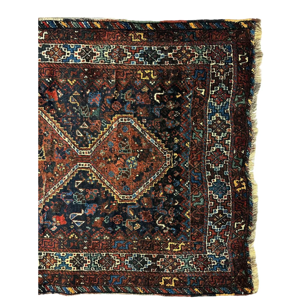 Antique 1920s Persian Khamseh tribal rug with dark red and blue geometric patterns