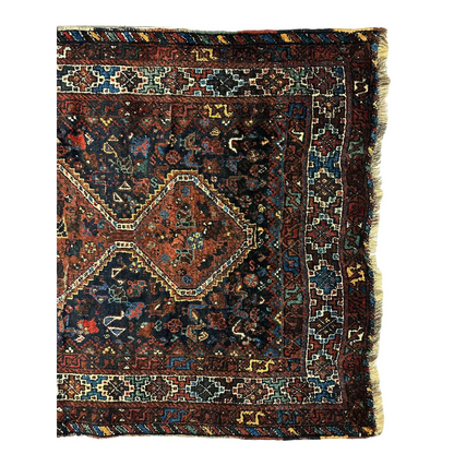 Antique 1920s Persian Khamseh tribal rug with dark red and blue geometric patterns