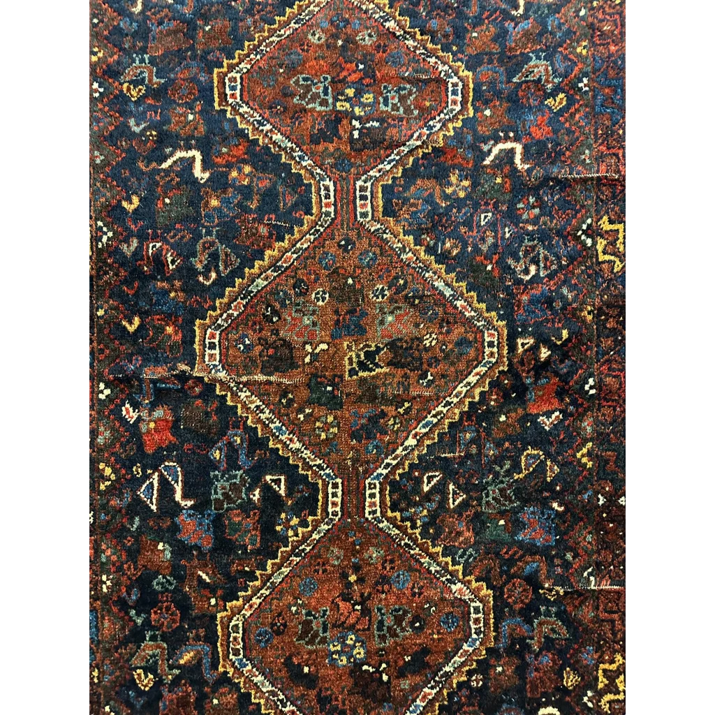 Stunning antique Persian Khamseh rug with intricate patterns