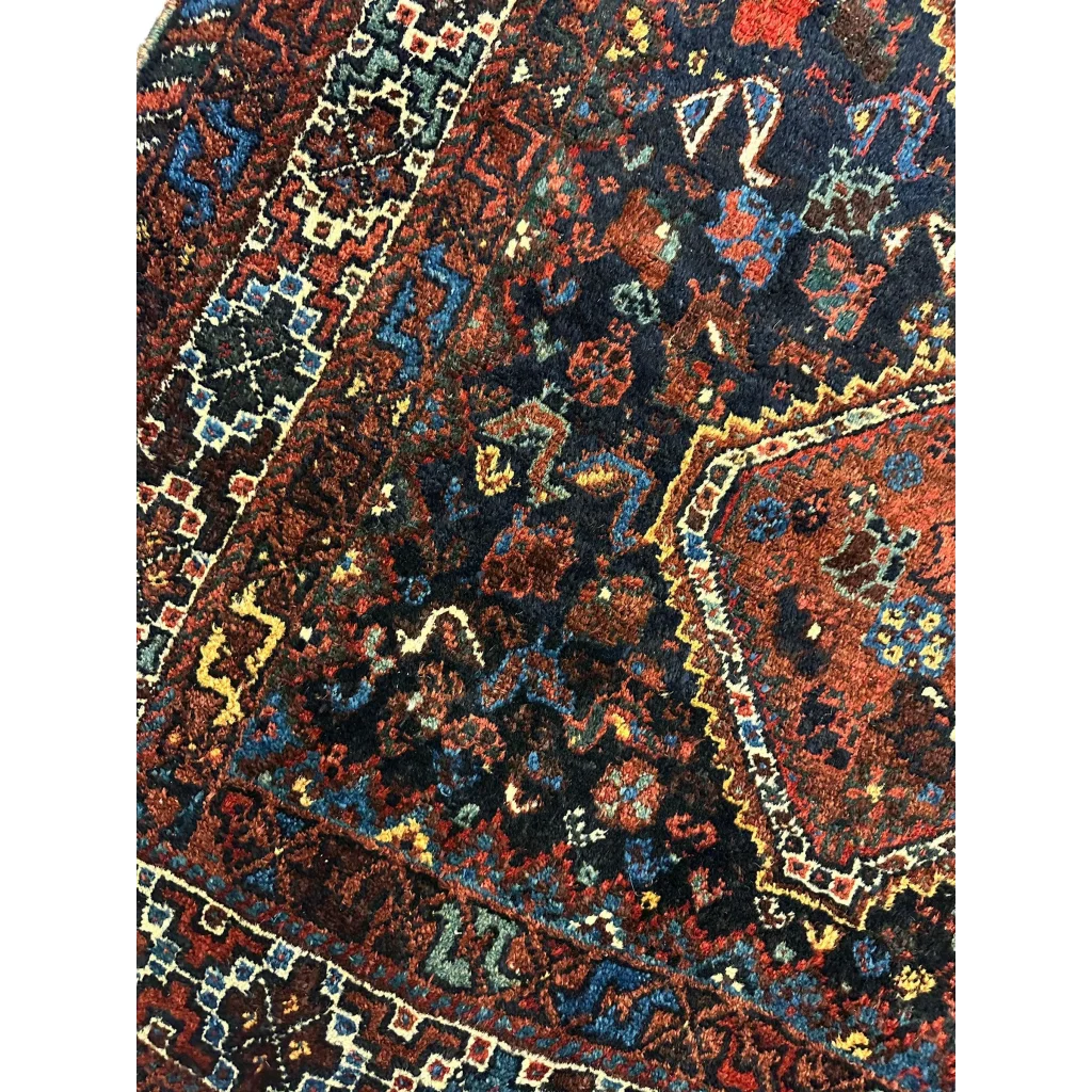 Antique Persian Khamseh rug from 1920s with burgundy navy gold patterns