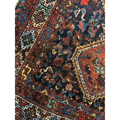 Antique Persian Khamseh rug from 1920s with burgundy navy gold patterns