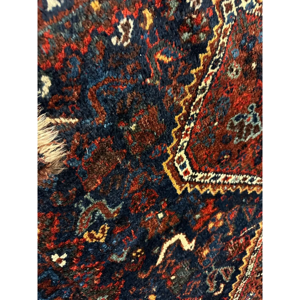 Stunning antique Persian Khamseh rug with floral navy, burgundy, gold design