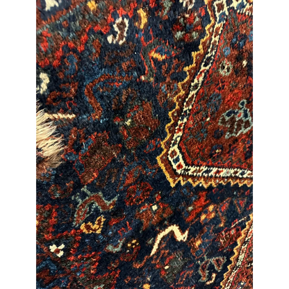 Stunning antique Persian Khamseh rug with floral navy, burgundy, gold design