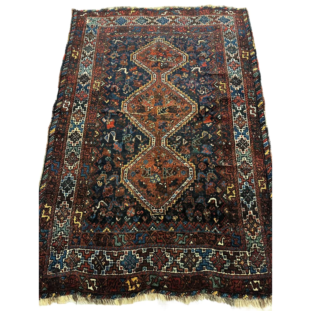 Stunning antique Persian Khamseh rug from 1920s with intricate patterns