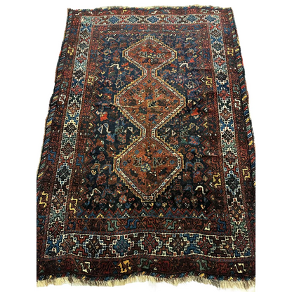 Stunning antique Persian Khamseh rug from 1920s with intricate patterns