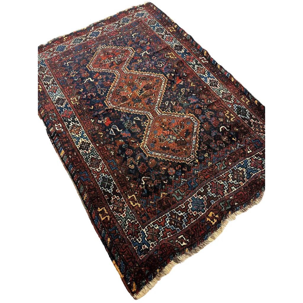 Stunning antique Persian Khamseh rug from 1920s with intricate patterns