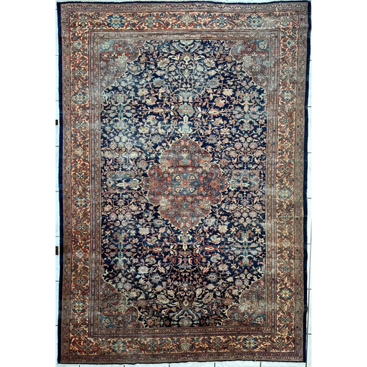 Stunning antique Persian Mahal rug with navy blue field and floral patterns