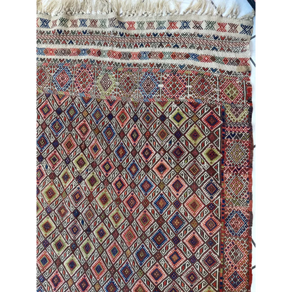 Stunning antique Turkish Jajim wool rug with intricate geometric patterns in earthy red, brown, and blue tones