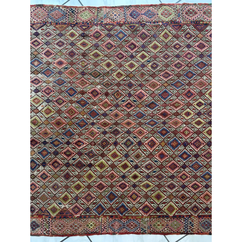 Vintage antique Turkish Jajim wool rug with geometric diamond motifs