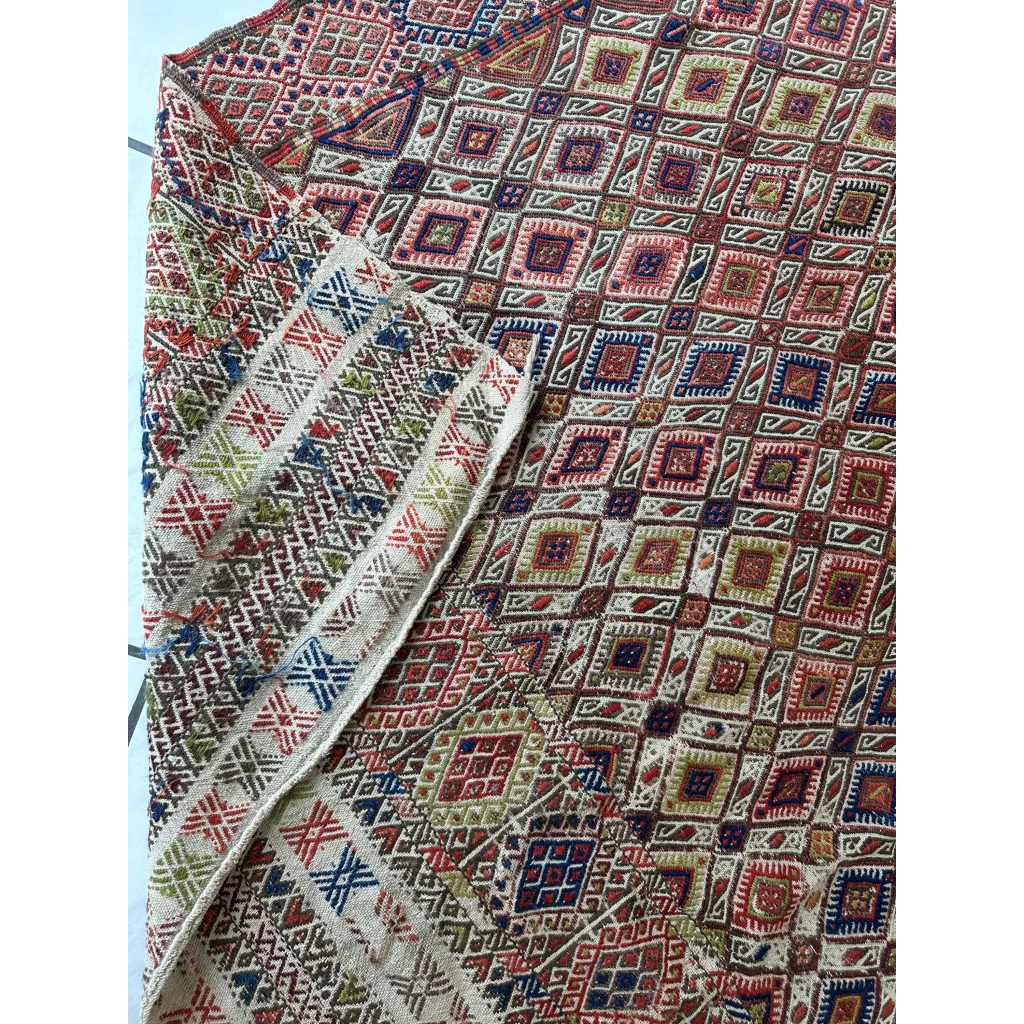 Stunning antique Turkish jajim wool rug with intricate geometric patterns in reds and blues