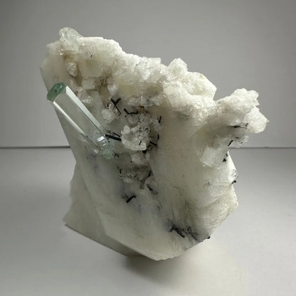 Stunning aquamarine beryl crystal with black tourmaline on albite