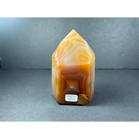 Stunning banded carnelian tower from Brazil with orange cream facets