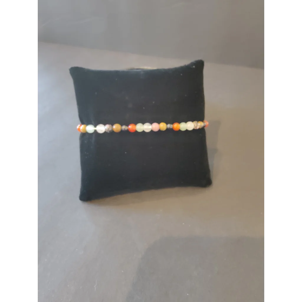 Stunning 4mm beaded stone bracelet with orange, peach, cream gems