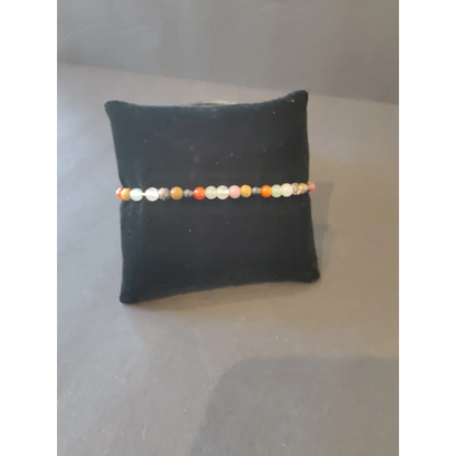 Stunning 4mm beaded stone bracelet with orange, peach, cream gems