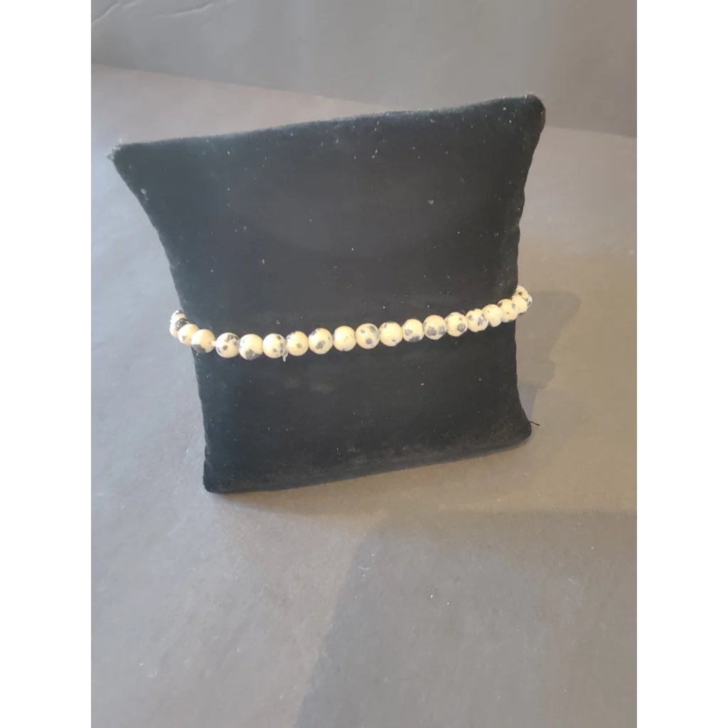 Stunning 4mm beaded stone bracelet with cream beads and black speckles
