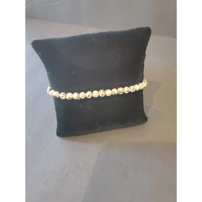 Stunning 4mm beaded stone bracelet with cream beads and black speckles