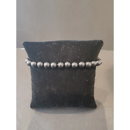 Silver beaded stone bracelet with 6mm round metallic spheres