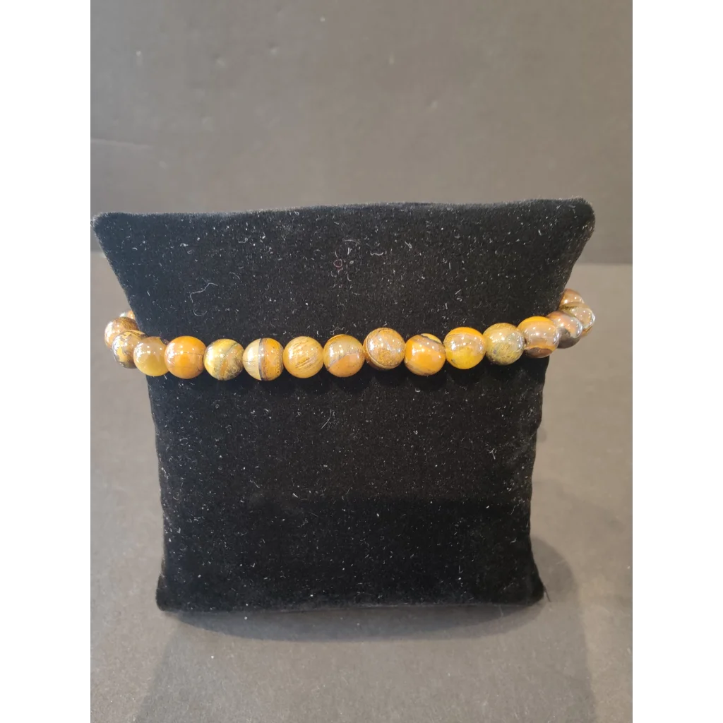 Stunning yellow brown tiger eye beaded stone bracelet 6mm on black velvet