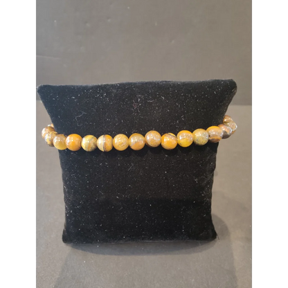 Stunning yellow brown tiger eye beaded stone bracelet 6mm on black velvet