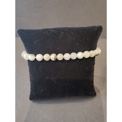 Elegant 6mm beaded stone bracelet with creamy white translucent gems