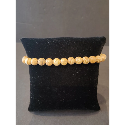Stunning 6mm beaded stone bracelet with natural yellowish-beige gems