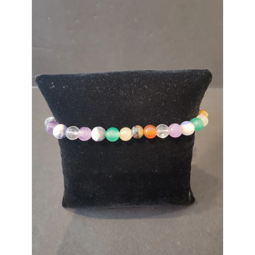 Colorful 6mm beaded stone bracelet with purple, green, orange gems