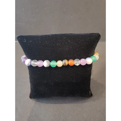 Colorful 6mm beaded stone bracelet with purple, green, orange gems