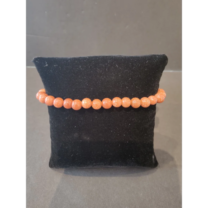 Stunning 6mm orange sandstone beaded stone bracelet with glittery beads