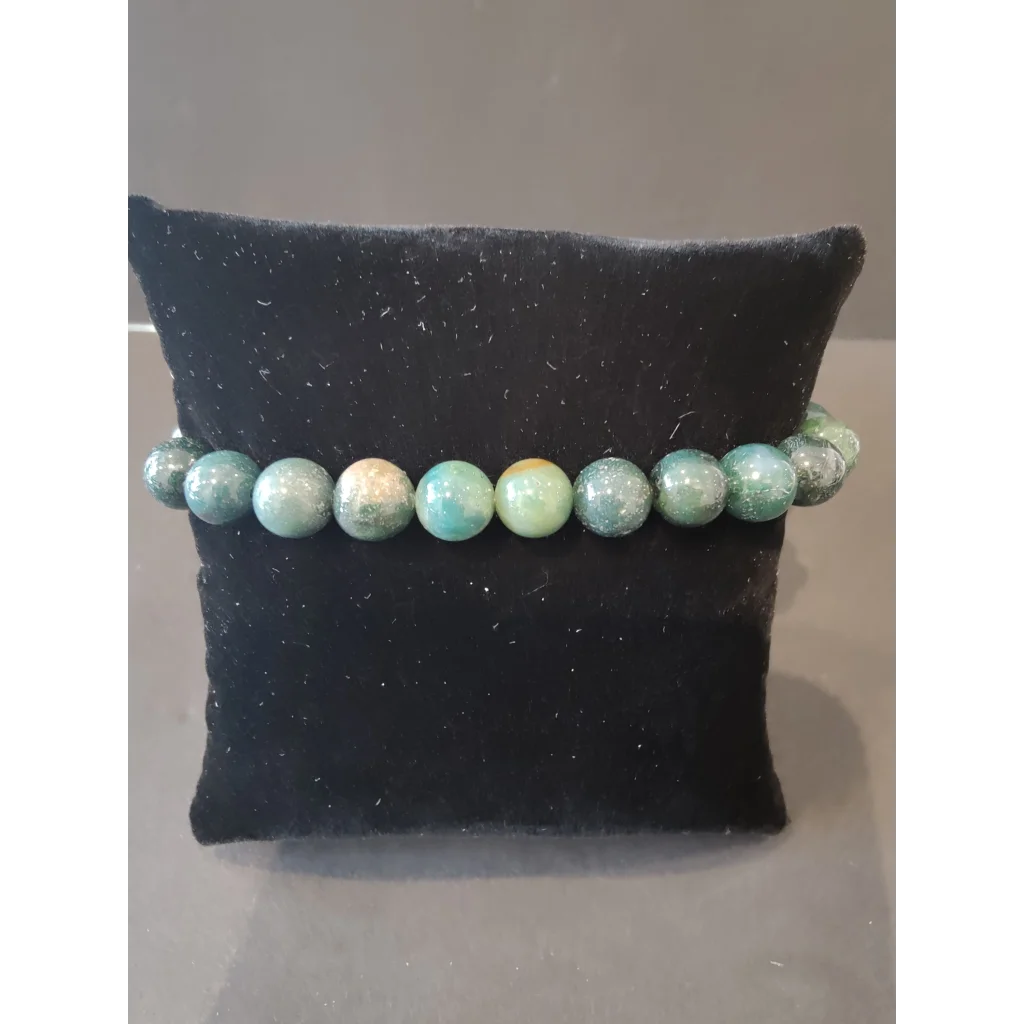 Stunning turquoise green aventurine beaded stone bracelet on black velvet