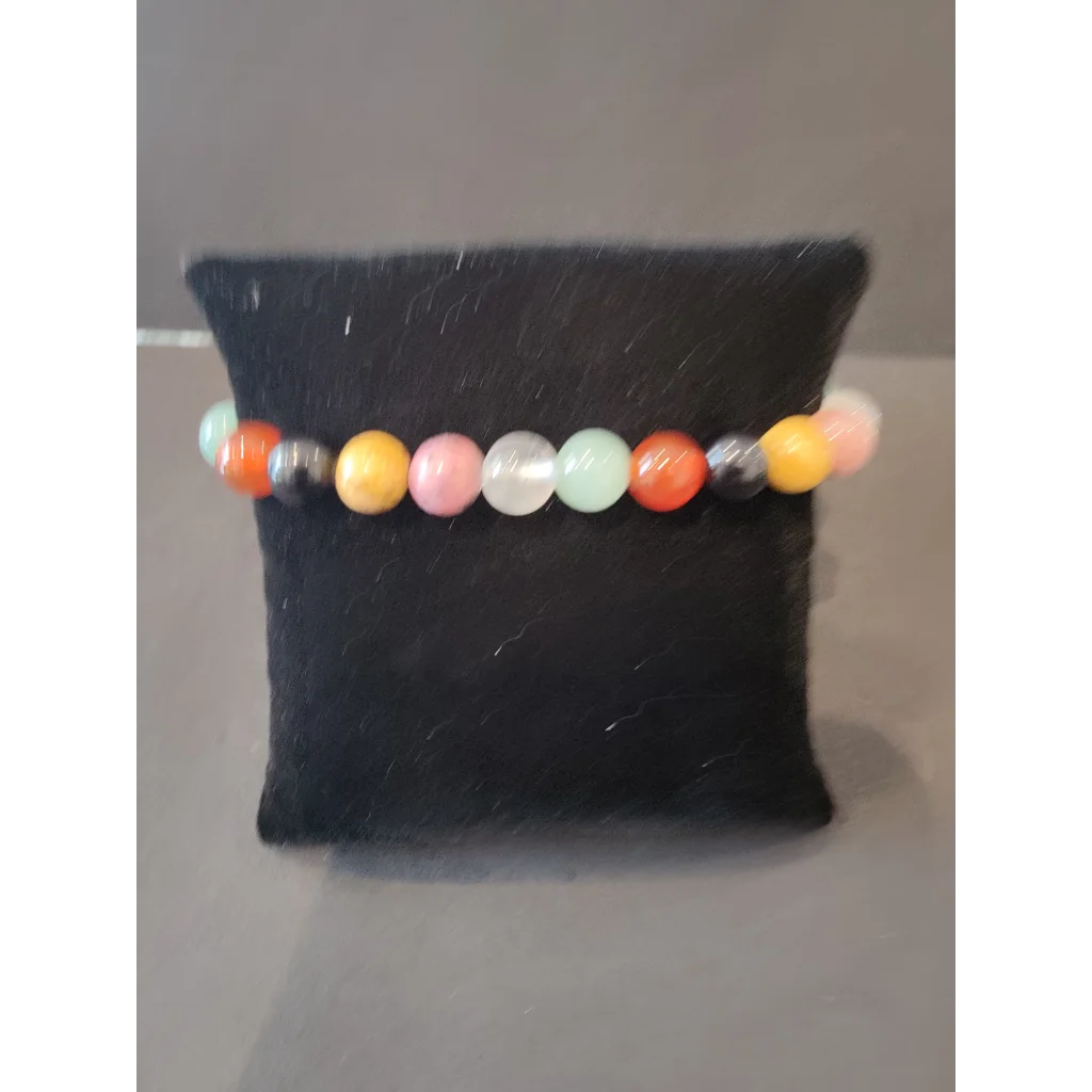 Vibrant beaded stone bracelet with 8mm gemstone beads in orange, pink, yellow, mint, and white