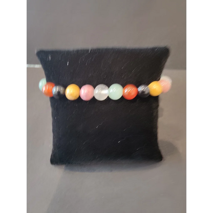 Vibrant beaded stone bracelet with 8mm gemstone beads in orange, pink, yellow, mint, and white