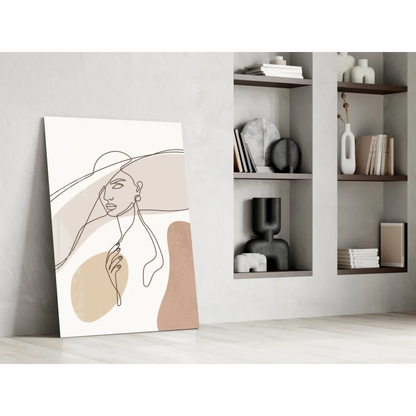 Beige minimalist wall art print of womans face with flowing black lines on canvas