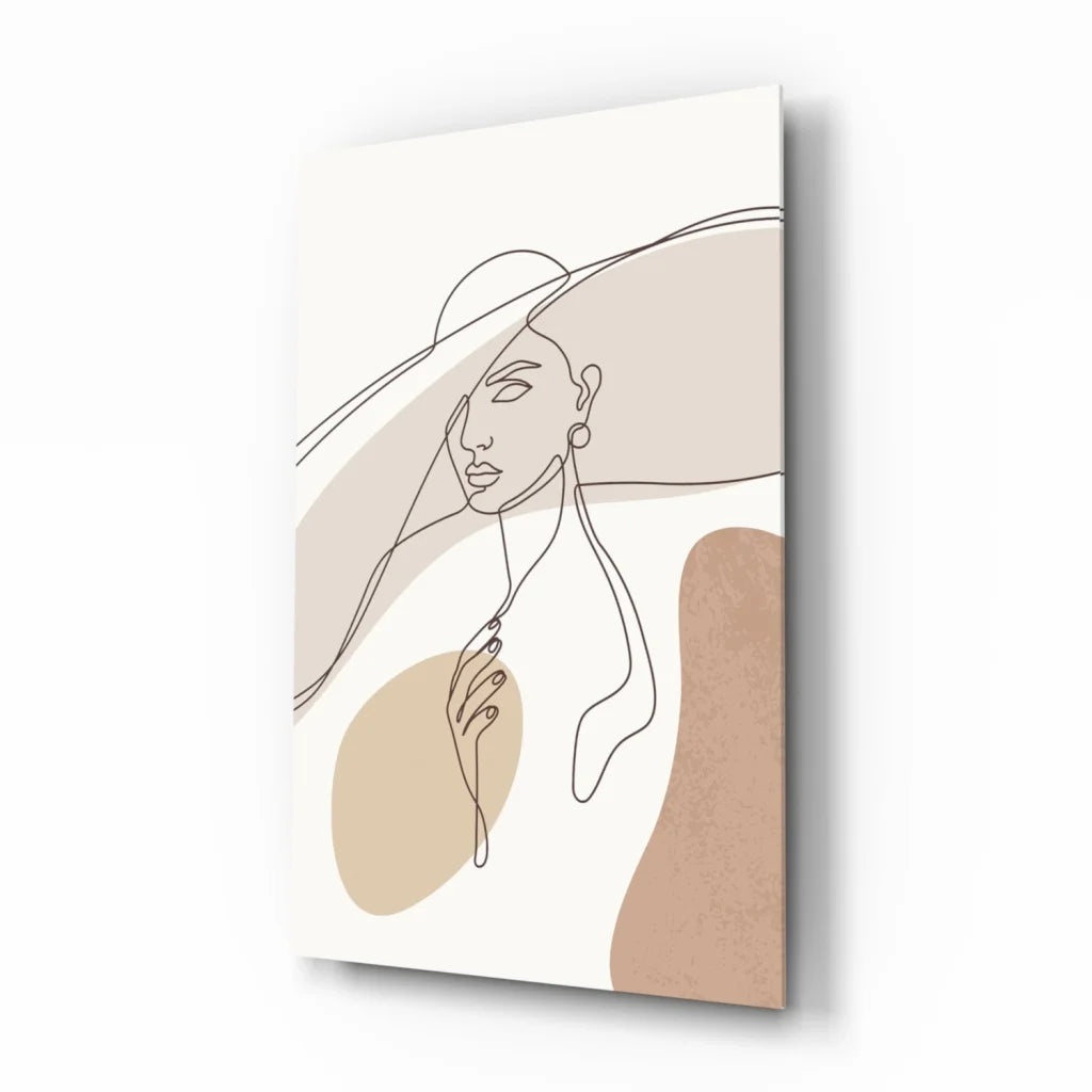 Beige abstract wall art print of woman in wide-brimmed hat with minimalist black lines