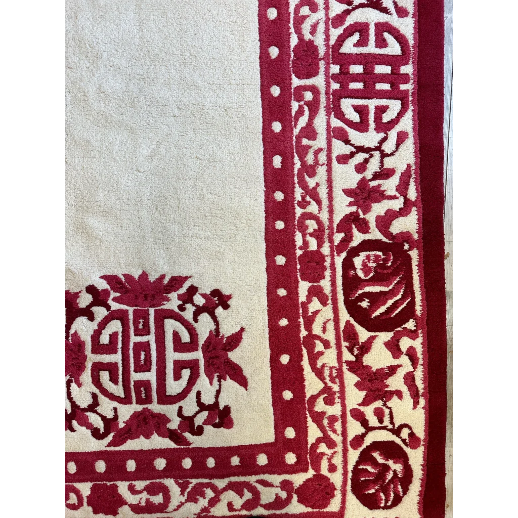 Chinese Art Deco wool rug, detail of red floral and foliate motifs on cream ground, hand-knotted India