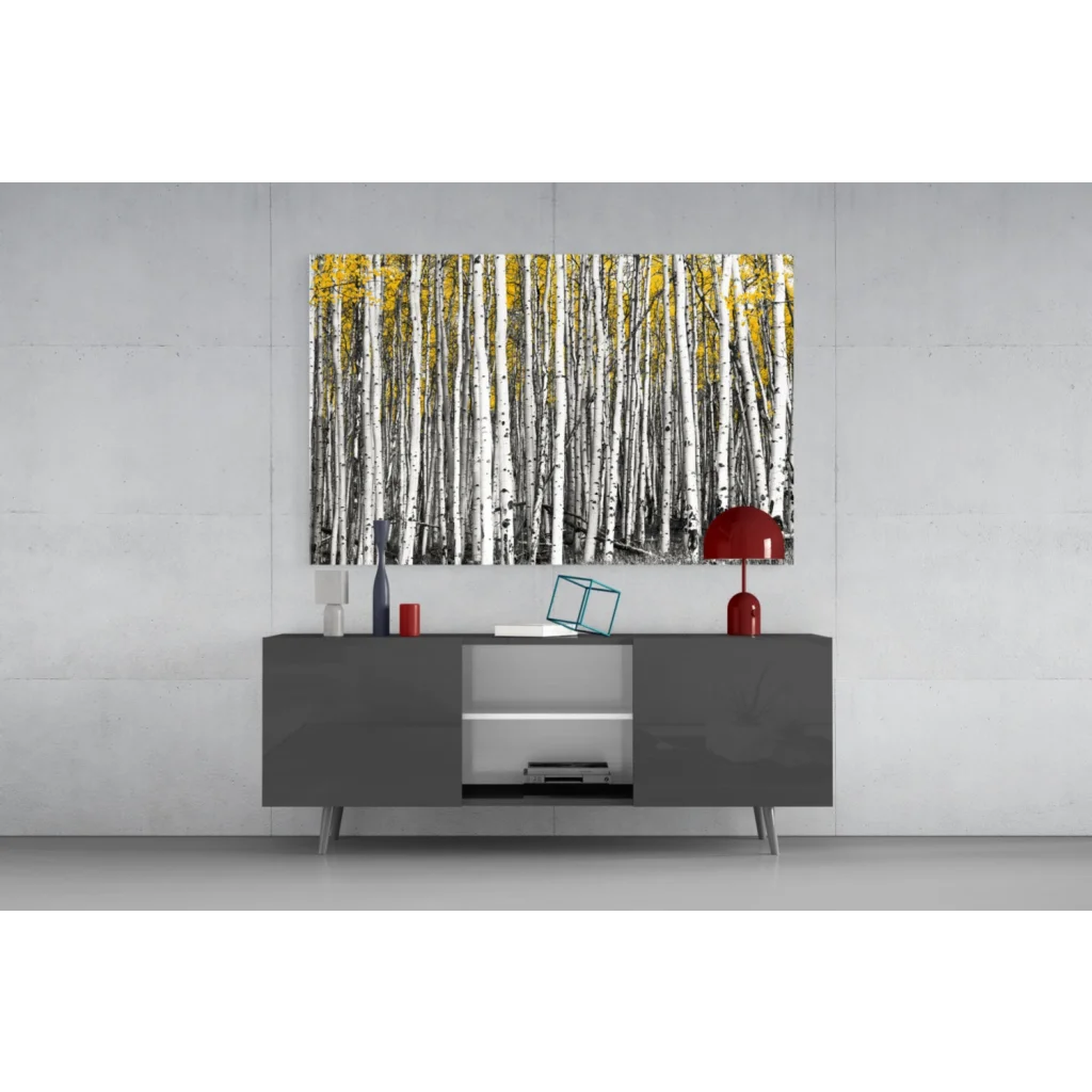 Modern gray sideboard under stunning birch forest wall art with golden leaves