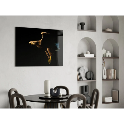 Stunning Black Eagle wall art with gold accents over black dining set