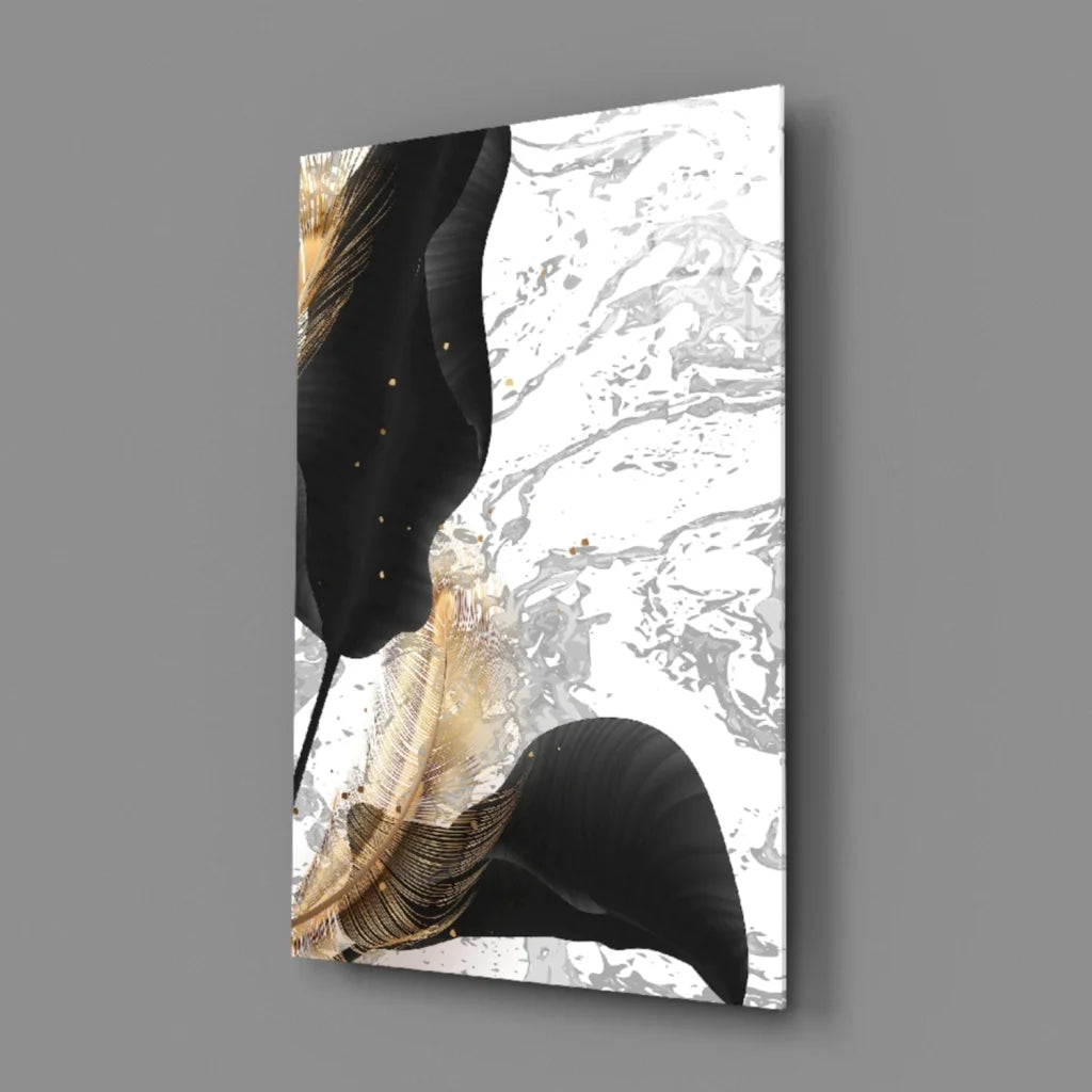 Black and gold feather wall art with marble background design.