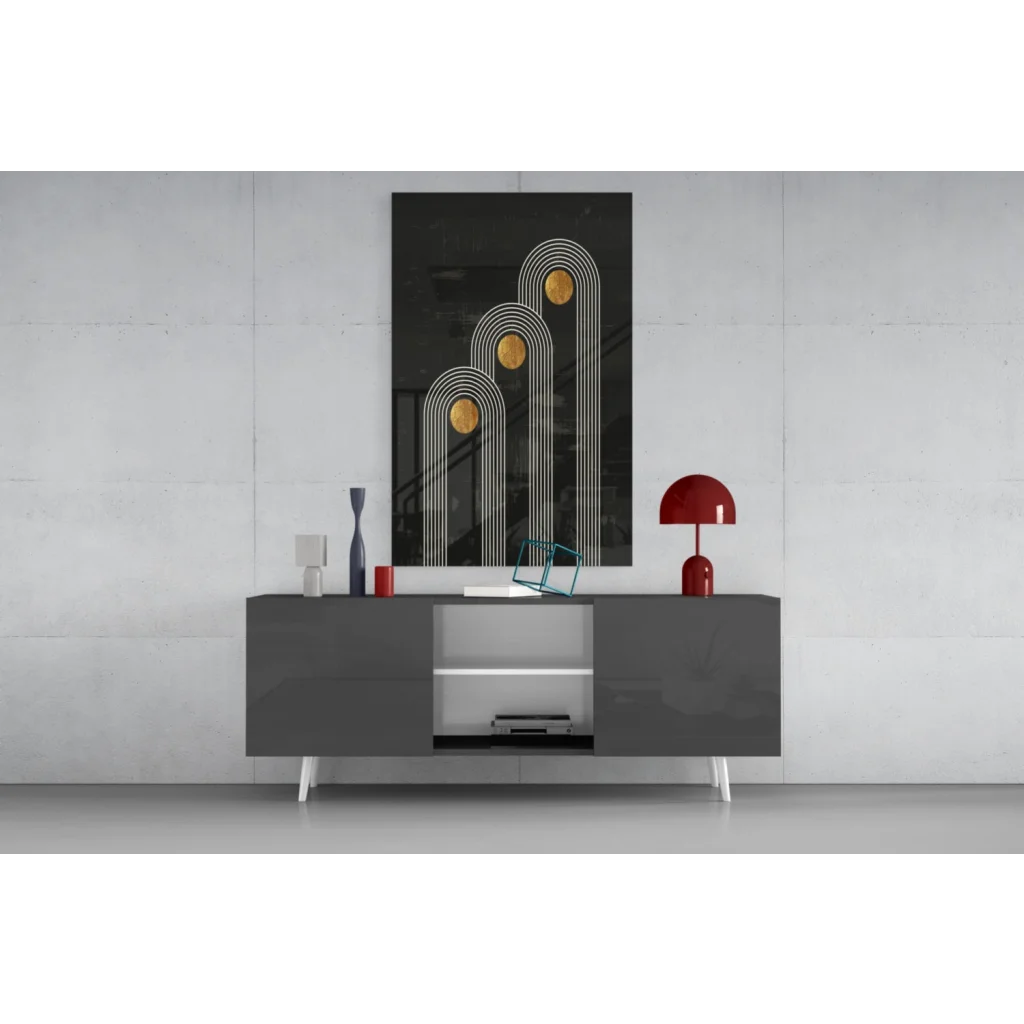 Modern black and white sideboard with sleek legs under geometric wall art print