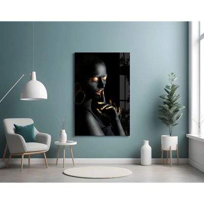 Black and gold portrait canvas wall art of woman with golden eyes, lips, hand