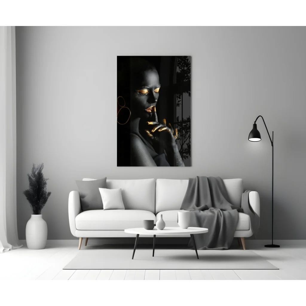 Black and gold portrait canvas wall art above white sofa