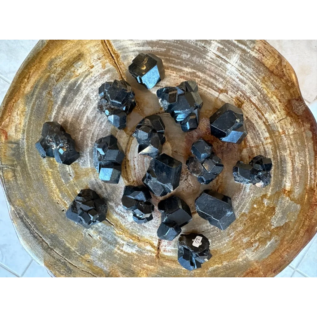 Stunning black melanite garnet crystal from Mali Africa on wood