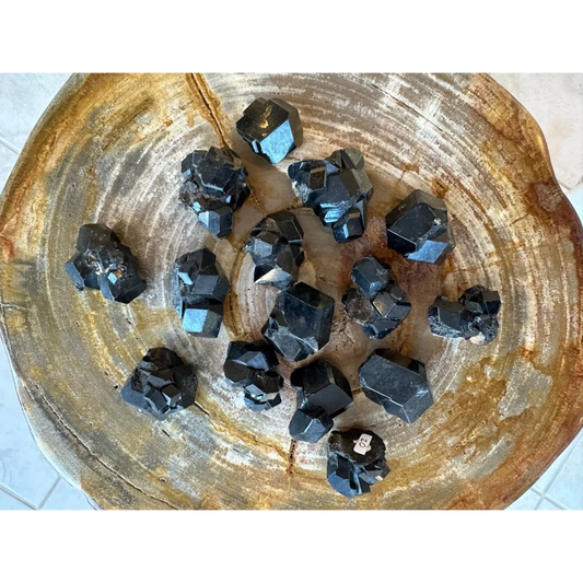 Stunning black melanite garnet crystal from Mali Africa on wood