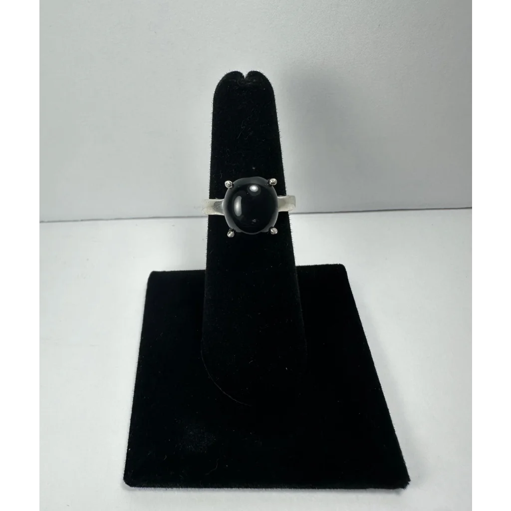 Sleek black onyx ring in sterling silver with prong setting