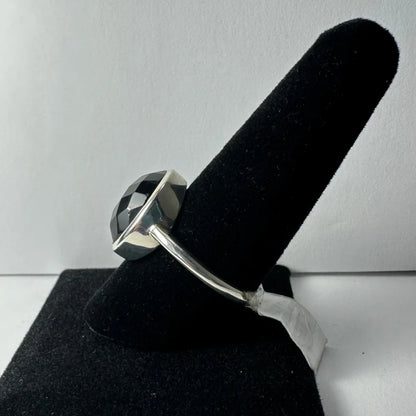 Sleek black onyx ring in sterling silver with faceted stone