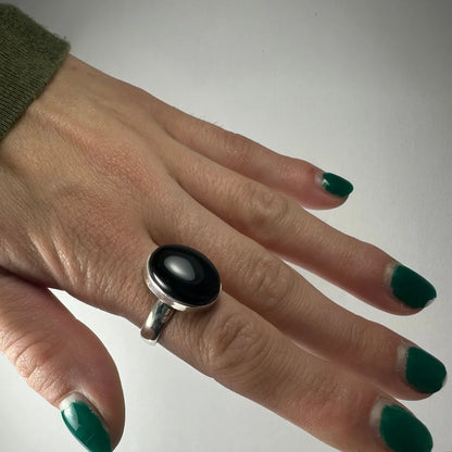Sleek silver black onyx ring with smooth oval stone