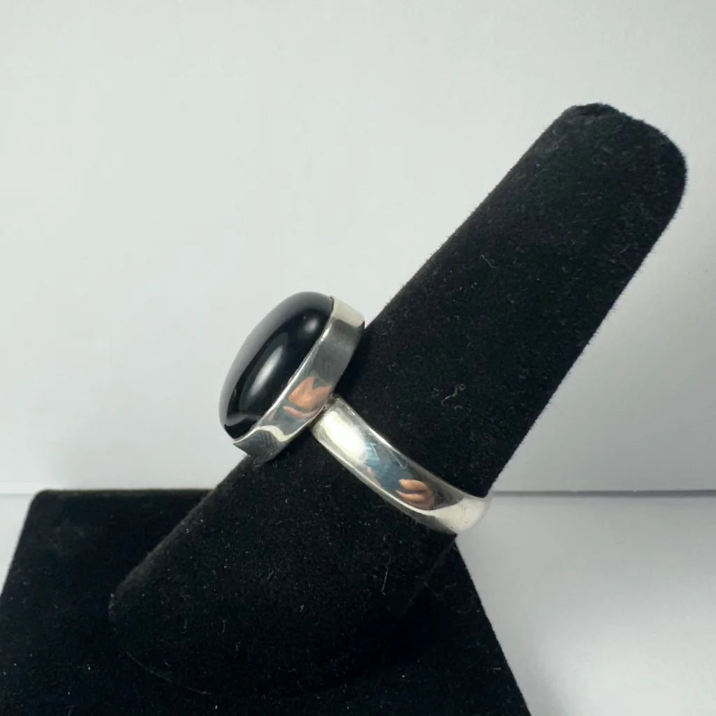 Sleek sterling silver black onyx ring with oval stone